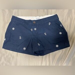 Nautical navy blue shorts with white embroidered anchors and ship wheels